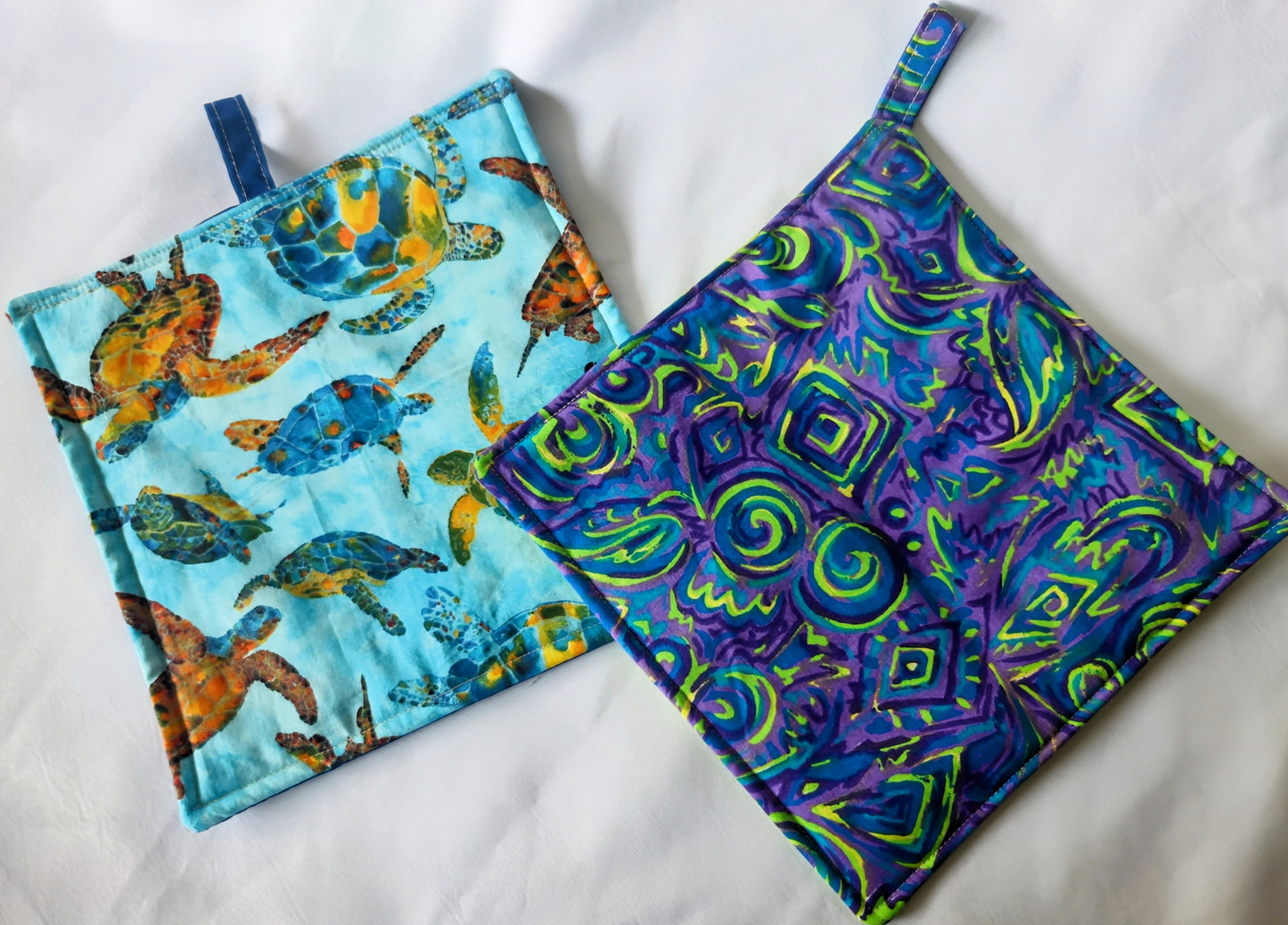 POTHOLDERS